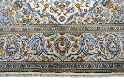 Full view of 2000s Kashan rug from Iran / Persia, 317 × 195 cm in Beige tones