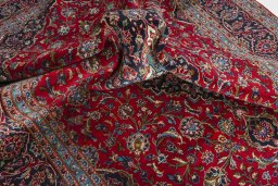 Surface texture of 2000s Kashan rug with natural Wool and intricate pattern