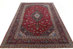 Surface texture of 2000s Kashan rug with natural Wool and intricate pattern