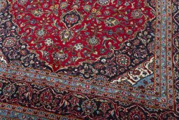 Close-up detail of 2000s Kashan rug from Iran / Persia showing Wool weave