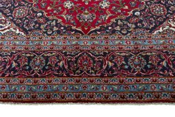 Full view of 2000s Kashan rug from Iran / Persia, 361 × 250 cm in Red tones