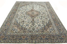 Surface texture of 2000s Kashan rug with natural Wool and intricate pattern