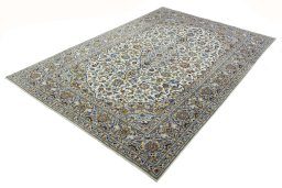 Corner detail of 2000s Kashan rug showing border pattern and Wool pile