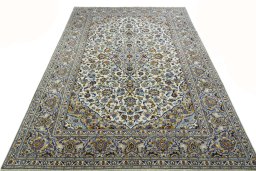 Surface texture of 2000s Kashan rug with natural Wool and intricate pattern