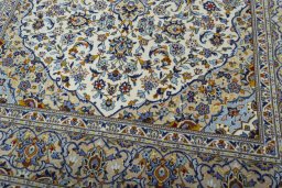 Close-up detail of 2000s Kashan rug from Iran / Persia showing Wool weave