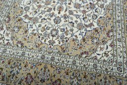 Close-up detail of 2000s Kashan rug from Iran / Persia showing Wool weave