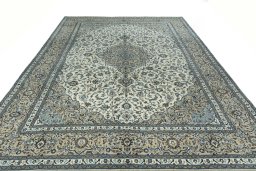 Surface texture of 2000s Kashan rug with natural Wool and intricate pattern