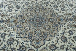 Central medallion detail of 2000s Kashan rug from Iran / Persia