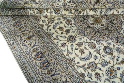 Close-up detail of 2000s Kashan rug from Iran / Persia showing Wool weave