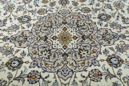 Central medallion detail of 2000s Kashan rug from Iran / Persia