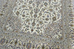 Close-up detail of 2000s Kashan rug from Iran / Persia showing Wool weave
