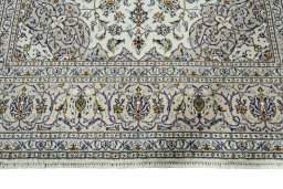 Full view of 2000s Kashan rug from Iran / Persia, 306 × 195 cm in Beige tones