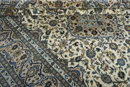 Close-up detail of 2000s Kashan rug from Iran / Persia showing Wool weave