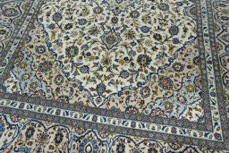 Close-up detail of 2000s Kashan rug from Iran / Persia showing Wool weave