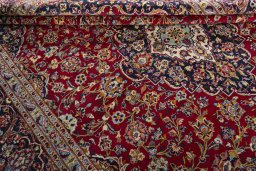 Close-up detail of 2000s Kashan rug from Iran / Persia showing Wool weave