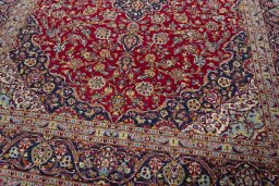Close-up detail of 2000s Kashan rug from Iran / Persia showing Wool weave