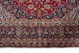 Full view of 2000s Kashan rug from Iran / Persia, 418 × 304 cm in Red tones