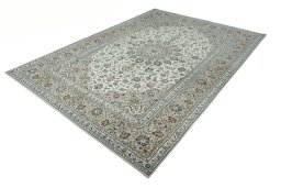 Corner detail of 2000s Kashan rug showing border pattern and Wool pile