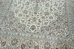 Close-up detail of 2000s Kashan rug from Iran / Persia showing Wool weave