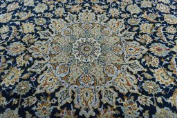 Central medallion detail of 1970s Kashan rug from Iran / Persia