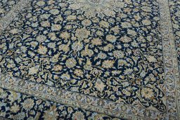 Close-up detail of 1970s Kashan rug from Iran / Persia showing Wool weave