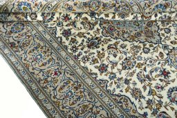 Close-up detail of 2000s Kashan rug from Iran / Persia showing Wool weave