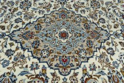 Central medallion detail of 2000s Kashan rug from Iran / Persia