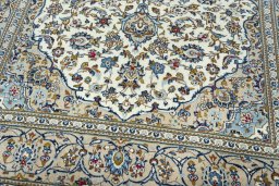 Close-up detail of 2000s Kashan rug from Iran / Persia showing Wool weave