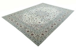Corner detail of 2000s Kashan rug showing border pattern and Wool pile