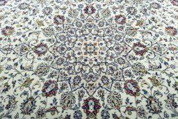 Central medallion detail of 2000s Kashan rug from Iran / Persia