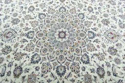 Central medallion detail of 2000s Kashan rug from Iran / Persia