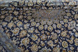 Close-up detail of 1970s Kashan rug from Iran / Persia showing Wool weave