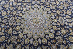 Central medallion detail of 1970s Kashan rug from Iran / Persia