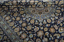 Close-up detail of 1970s Kashan rug from Iran / Persia showing Wool weave