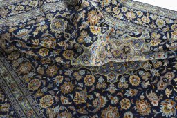 Surface texture of 1970s Kashan rug with natural Wool and intricate pattern