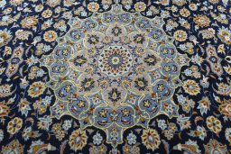 Central medallion detail of 1970s Kashan rug from Iran / Persia