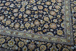 Close-up detail of 1970s Kashan rug from Iran / Persia showing Wool weave