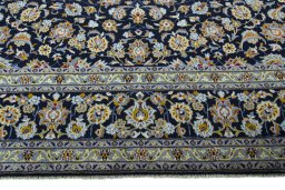 Full view of 1970s Kashan rug from Iran / Persia, 430 × 315 cm in Blue tones