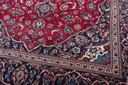 Close-up detail of 2000s Kashan rug from Iran / Persia showing Wool weave