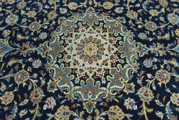 Central medallion detail of 2000s Kashan rug from Iran / Persia