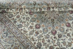 Close-up detail of 2000s Kashan rug from Iran / Persia showing Wool weave