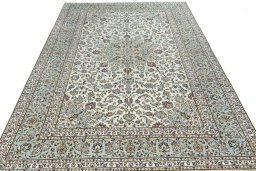 Surface texture of 2000s Kashan rug with natural Wool and intricate pattern