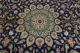 Central medallion detail of 2000s Kashan rug from Iran / Persia