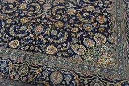 Close-up detail of 2000s Kashan rug from Iran / Persia showing Wool weave