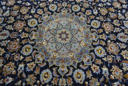 Central medallion detail of 2000s Kashan rug from Iran / Persia