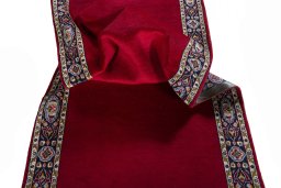 Corner detail of 2000s Kashan rug showing border pattern and Wool pile