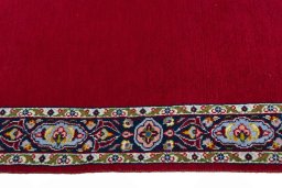 Close-up detail of 2000s Kashan rug from Iran / Persia showing Wool weave