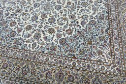 Close-up detail of 2000s Kashan rug from Iran / Persia showing Wool weave