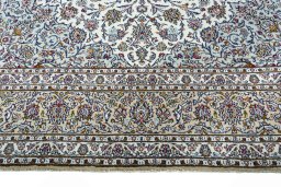 Full view of 2000s Kashan rug from Iran / Persia, 405 × 296 cm in Beige tones