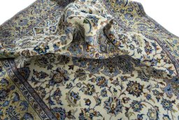Surface texture of 1970s Kashan rug with natural Wool and intricate pattern
